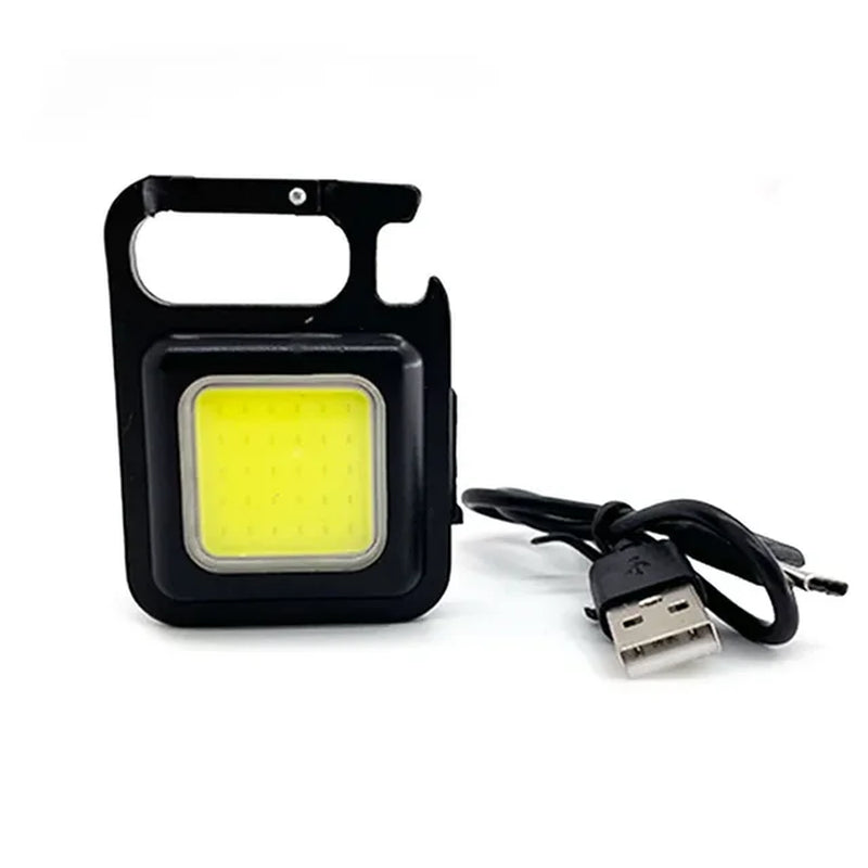 "Super Bright Mini LED Flashlight Keychain - Rechargeable, Portable, and Perfect for Outdoor Adventures!"